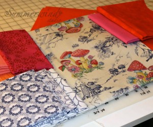 Center: focus fabric for "Alice's Cabin" mini-quilt